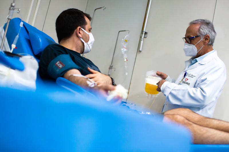 Andre Magalhaes, nurse, donates plasma through a process called plasmapheresis at Hemorio amidst the coronavirus (COVID-19) pandemic on June 5, 2020 in Rio de Janeiro, Brazil. Hemorio is one of the institutions that uses plasma transfusion technology, when the blood of patients that survived COVID-19 is utilized to strengthen the immunity of other victims infected by the virus. Hematologist Alvaro D'alincourt works at Hemorio on the front lines of fighting the virus, and is happy with the results of the transfusions. He claims two employees had the disease and responded very well to the use of plasma.