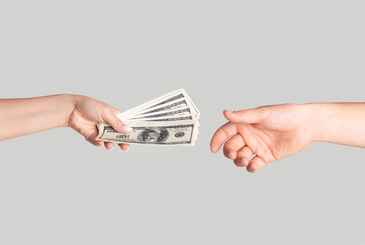handing over some money