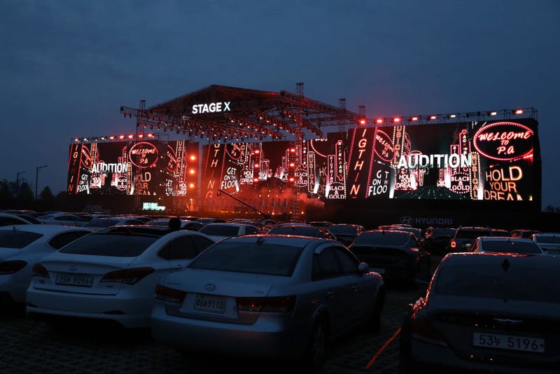ars are parked at a drive-in musical operation by Hyundai Motor at Stage X Drive-in Concert as South Koreans take measures to protect themselves against the spread of coronavirus (COVID-19) on May 23, 2020 in Goyang, South Korea.