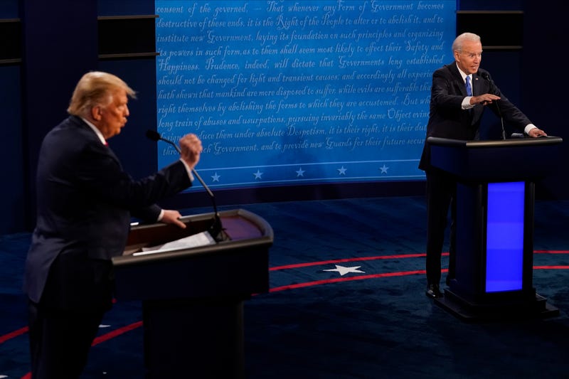 Democratic presidential candidate former Vice President Joe Biden answers a question as President Donald Trump listens during the second and final presidential debate at Belmont University on October 22, 2020 in Nashville, Tennessee.