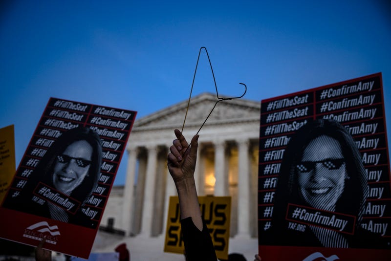 People that both support and oppose the nomination of Judge Amy Coney Barrett demonstrate in front of the Supreme Court of the United States on October 26, 2020 in Washington, DC. It is expected that the Senate will vote on the nomination of Judge Amy Coney Barrett to be an Associate Justice of the Supreme Court later in the day.