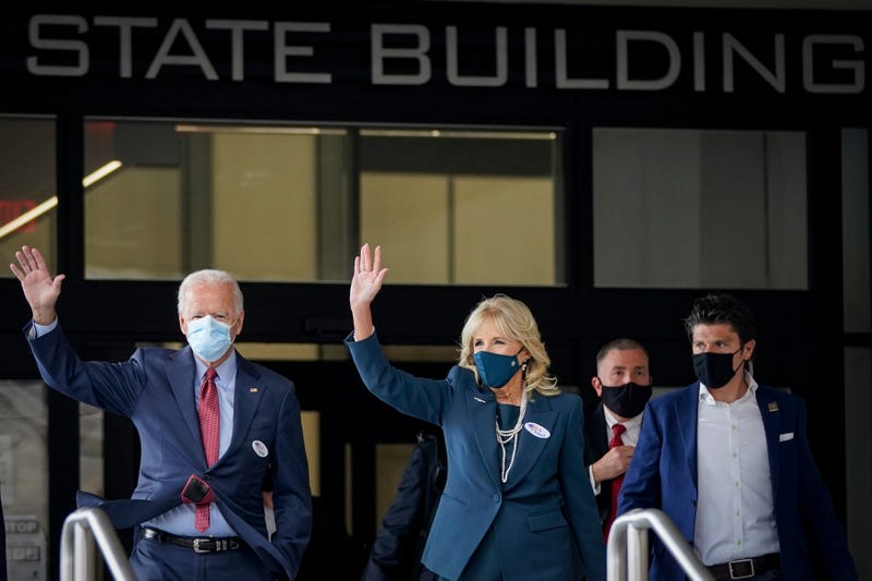 Democratic presidential candidate Joe Biden and his wife Dr. Jill Biden depart the Delaware State Building after casting their ballots for the general election on October 28, 2020 in Wilmington, Delaware.