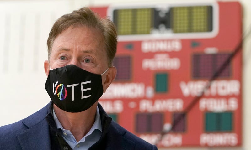 Connecticut Governor Ned Lamont prepares to cast his vote at Greenwich High School in Greenwich, Connecticut, on November 3, 2020.