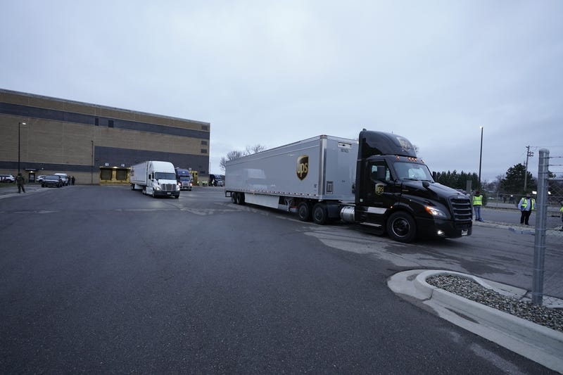 Boxes containing the Pfizer-BioNTech COVID-19 vaccine are prepared to be shipped at the Pfizer Global Supply Kalamazoo manufacturing plant on December 13, 2020 in Portage, Michigan.