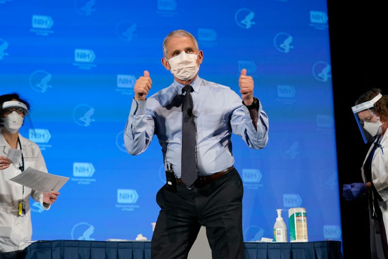 Dr. Anthony Fauci, director of the National Institute of Allergy and Infectious Diseases, gives the thumbs up after receiving his first dose of the COVID-19 vaccine at the National Institutes of Health on December 22, 2020 in Bethesda, Maryland.