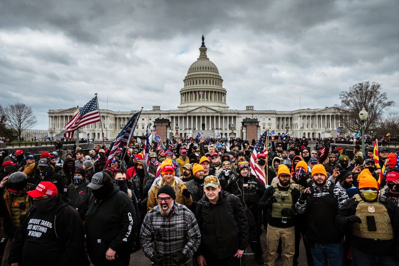 Pro-Trump protesters gather in front of the U.S. Capitol Building on January 6, 2021 in Washington, DC. A pro-Trump mob stormed the Capitol, breaking windows and clashing with police officers. Trump supporters gathered in the nation's capital today to protest the ratification of President-elect Joe Biden's Electoral College victory over President Trump in the 2020 election.