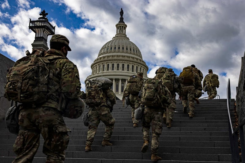 National Guard soldier head to the east front of the U.S. Capitol from the Capitol Visitors Center on January 17, 2021 in Washington, DC. After last week's riots at the U.S. Capitol Building, the FBI has warned of additional threats in the nation's capital and in all 50 states. According to reports, as many as 25,000 National Guard soldiers will be guarding the city as preparations are made for the inauguration of Joe Biden as the 46th U.S. President.