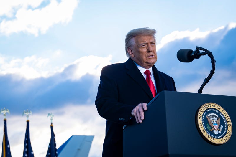 President Donald Trump speaks to supporters at Joint Base Andrews before boarding Air Force One for his last time as President on January 20, 2021 in Joint Base Andrews, Maryland.