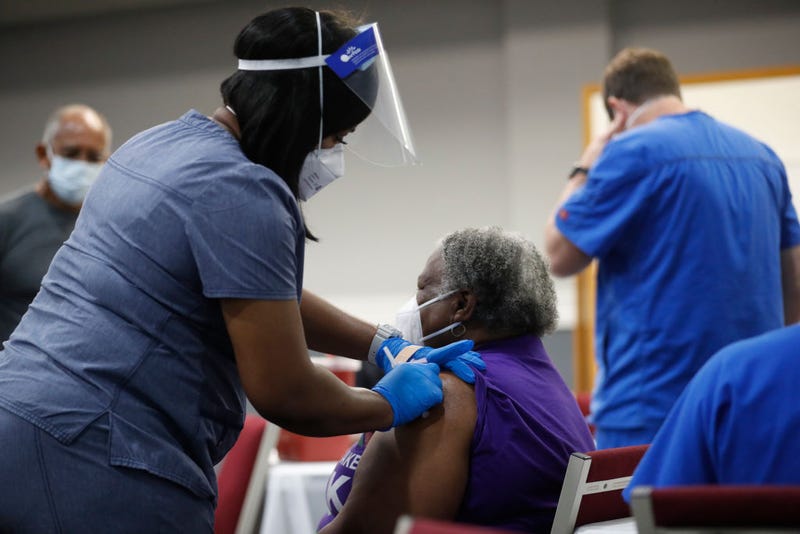 A community works to assist residents who are 65 and older to obtain the Covid-19 vaccine.