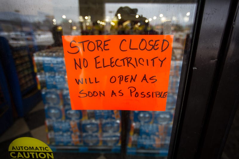 Winter Storm no electricity store closed sign