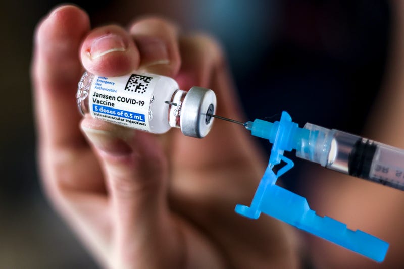 Adams 12 Five Star Schools District RN Tiffany Karschamroon draws a dose from a vial of the Johnson & Johnson COVID-19 vaccine, the newest vaccine approved by the U.S. FDA for emergency use, at an event put on by the Thornton Fire Department on March 6, 2021 in Thornton, Colorado.