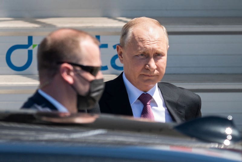 Russia's President Vladimir Putin disembarks from his plane on June 16, 2021, for the U.S.-Russia summit in Geneva.