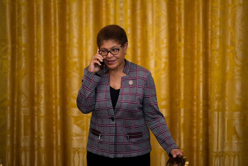 WASHINGTON, DC - JUNE 17: Rep. Karen Bass (D-CA) speaks on the phone before U.S. President Joe Biden signs the Juneteenth National Independence Day Act into law in the East Room of the White House on June 17, 2021 in Washington, DC. The Juneteenth holiday marks the end of slavery in the United States and the Juneteenth National Independence Day will become the 12th legal federal holiday — the first new one since Martin Luther King Jr. Day was signed into law in 1983. (Photo by Drew Angerer/Getty Images)