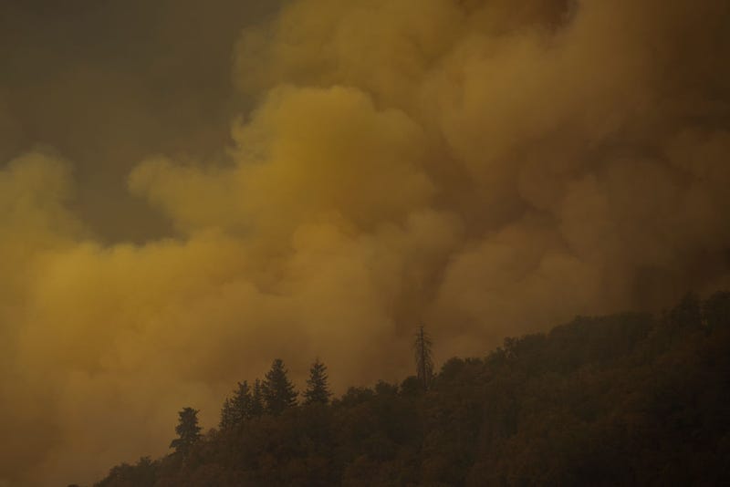 Smoke rises during an uphill run as the Windy Fire continues to grow on September 26, 2021 near California Hot Springs, California.