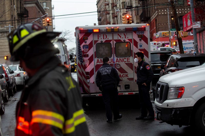 People at the scene of an apartment fire in the Bronx on Jan. 9, 2022