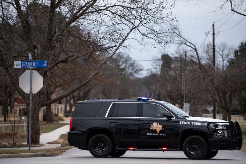 Texas State Trooper vehicle blocks off Shelton Drive on January 15, 2022 in Colleyville, Texas. Police responded to the situation after reports of a man with a gun was holding hostages at the synagogue. (Photo by Emil Lippe/Getty Images)