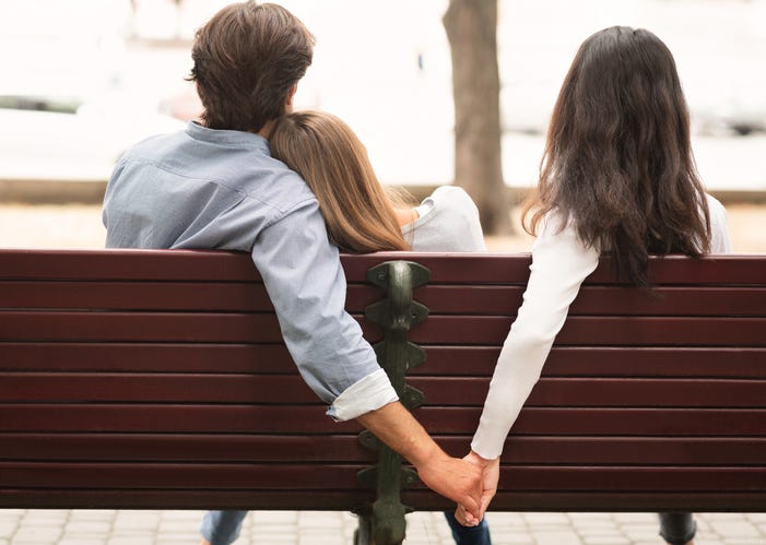 Boyfriend Holding Hands With Girlfriend's Friend