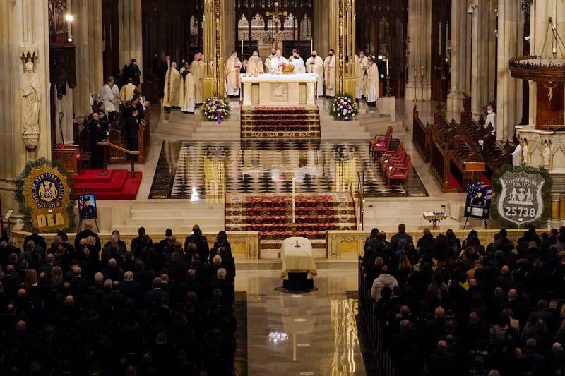Cardinal Timothy Dolan presides over the funeral service for NYPD Officer Jason Rivera inside St. Patrick's Cathedral on Jan. 28, 2022