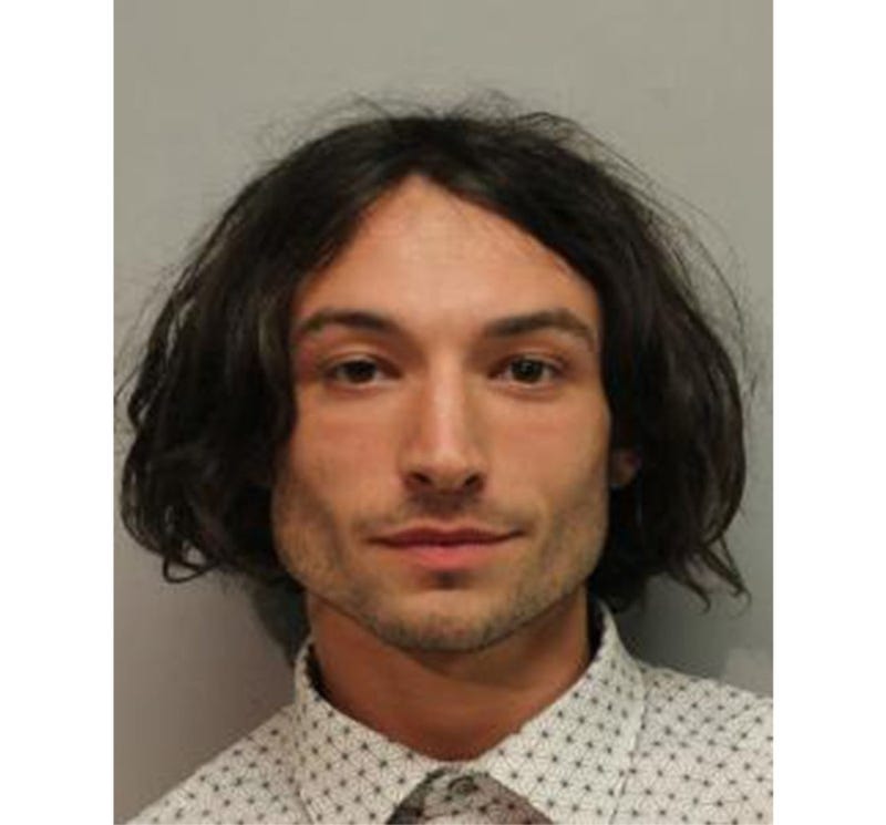 In this handout image provided by Hawaiʻi Police Department, Ezra Miller is seen in a police booking photo after his arrest for disorderly conduct and harassment on March 28, 2022 in Hilo, Hawaii.