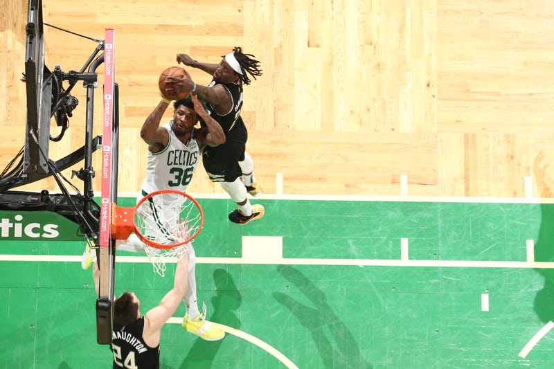 Jrue Holiday and Marcus Smart