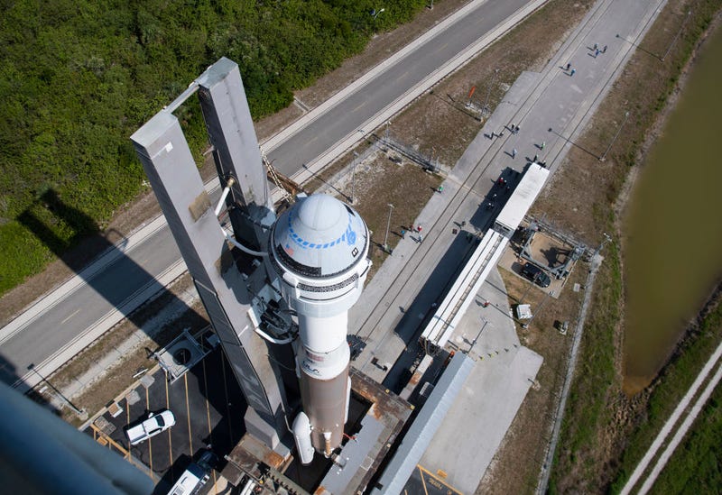 n this handout photo provided by NASA, a United Launch Alliance Atlas V rocket with Boeing's CST-100 Starliner spacecraft aboard is rolled out of the Vertical Integration Facility to the launch pad at Space Launch Complex 41 ahead of the Orbital Flight Test-2 (OFT-2) mission, on May 18, 2022 at Cape Canaveral Space Force Station in Cape Canaveral, Florida. Boeing's Orbital Flight Test-2 will be Starliner's second un-crewed flight test and will dock with the International Space Station as part of NASA's Commercial Crew Program. The mission, currently targeted for launch at 6:54 p.m. ET on May 19, will serve as an end-to-end test of the system's capabilities. (Photo by Joel Kowsky/NASA via Getty Images)