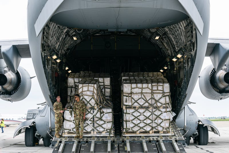 Airmen stand in the cargo bay of a U.S. Air Force C-17 carrying 78,000 lbs of Nestlé Health Science Alfamino Infant and Alfamino Junior formula from Europe at Indianapolis Airport on May 22, 2022 in Indianapolis, Indiana. The mission, known as Operation Fly Formula, is being executed to address an infant formula shortage caused by the closure of the United States largest formula manufacturing plant due to safety and contamination issues.