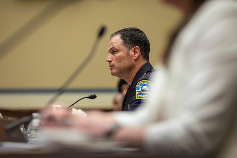 Joseph Gramaglia, Police Commissioner of Buffalo, New York, listens to Representative Clay Higgins, (R-LA) address him about gun violence during the House Oversight and Reform Committee hearing with victims' family members and survivors of the Buffalo, New York and Uvalde, Texas massacres on June 8, 2022 on Capitol Hill in Washington, DC. (Photo by Jason Andrew-Pool/Getty Images)