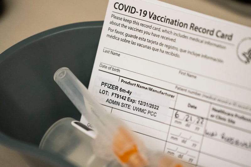 Doses of the Pfizer Covid-19 vaccine and vaccination record cards await pediatric patients at UW Medical Center - Roosevelt on June 21, 2022 in Seattle, Washington.