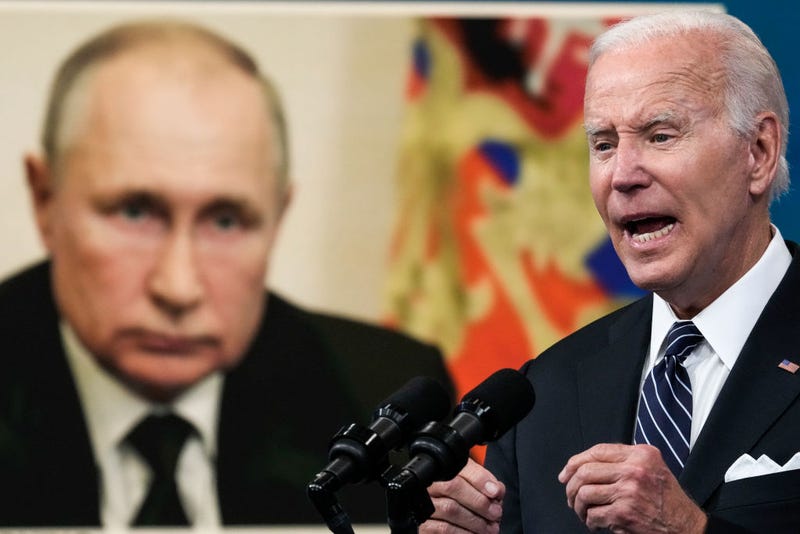 An image of Russian President Vladimir Putin is displayed as U.S. President Joe Biden speaks about gas prices in the South Court Auditorium at the White House campus on June 22, 2022 in Washington, DC.