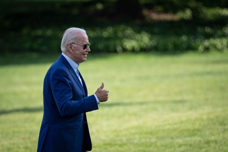 U.S. President Joe Biden gestures toward reporters as he departs Marine One and walks to the Oval Office on the South Lawn of the White House July 20, 2022 in Washington, DC.