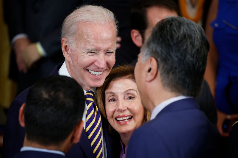 U.S. President Joe Biden gathers with Speaker of the House Nancy Pelosi (D-CA) and Rep. Mark Takano (D-CA) after signing The PACT Act in the East Room of the White House August 10, 2022 in Washington, DC. The bill is the biggest expansion of veteran's benefits since the Agent Orange Act of 1991 and will expand health care benefits to millions of veterans exposed to toxic substances during their military service. (Photo by Chip Somodevilla/Getty Images)