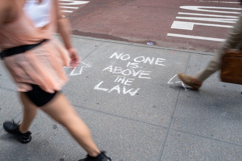 People walk by Trump Tower in Manhattan on August 10, 2022 in New York City. According to a recent report, the FBI was looking for nuclear-related documents aming other things when they searched Mar-a-Lago. (Photo by Spencer Platt/Getty Images)