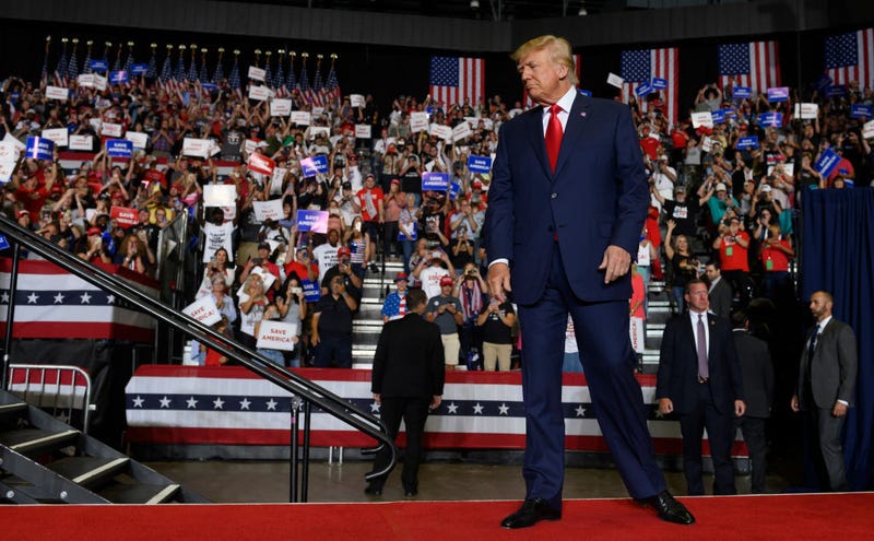 Former President Donald Trump enters the stage at a Save America Rally to support Republican candidates running for state and federal offices in the state of Ohio at the Covelli Centre on September 17, 2022 in Youngstown, Ohio.