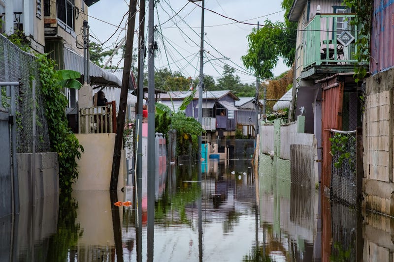 A flooded street is seen in the Juana Matos neighborhood of Catano, Puerto Rico, on September 19, 2022, after the passage of Hurricane Fiona.