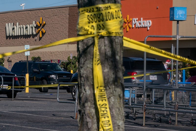 A police line is seen at the site of a fatal shooting in a Walmart on November 23, 2022 in Chesapeake, Virginia. Following the Tuesday night shooting, six people were killed.