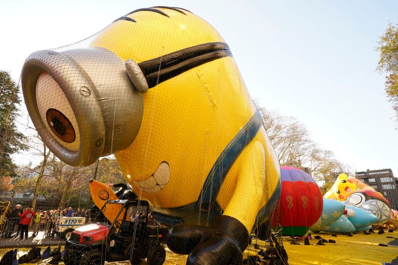 Members of the Macy's Inflation Team work to inflate the Stuart the Minion ballon, to be used in the upcoming 96th Macy's Thanksgiving Day Parade, in New York City on November 23, 2022.