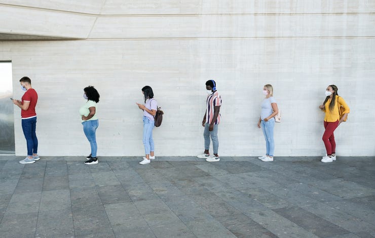 People standing far away from each other