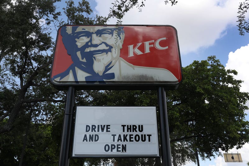 A KFC restaurant that closed its dining room and is only offering drive thru and takeout is seen on July 14, 2020 in Miami, Florida.