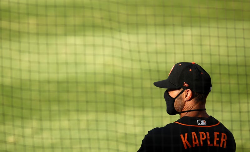 Manager Gabe Kapler of the San Francisco Giants stands in the dugout before their exhibition game against the Oakland Athletics at Oakland-Alameda County Coliseum on July 20, 2020 in Oakland, California.