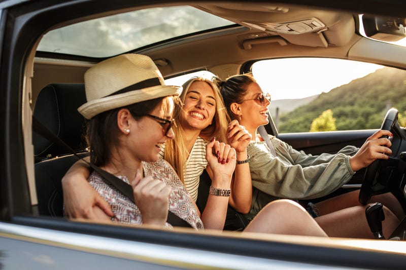 Excited Women Driving