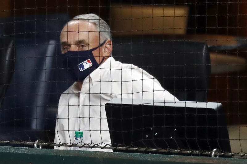 MLB commissioner Rob Manfred watching 2020 postseason game.