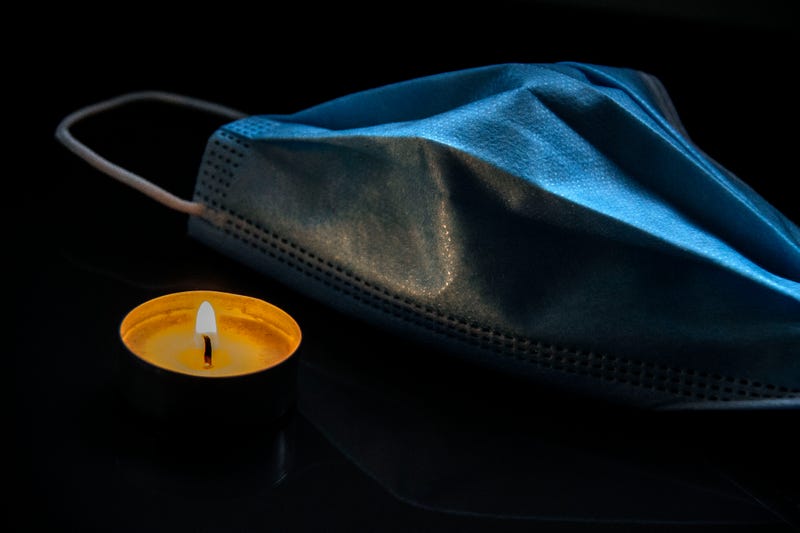 Mask and candle