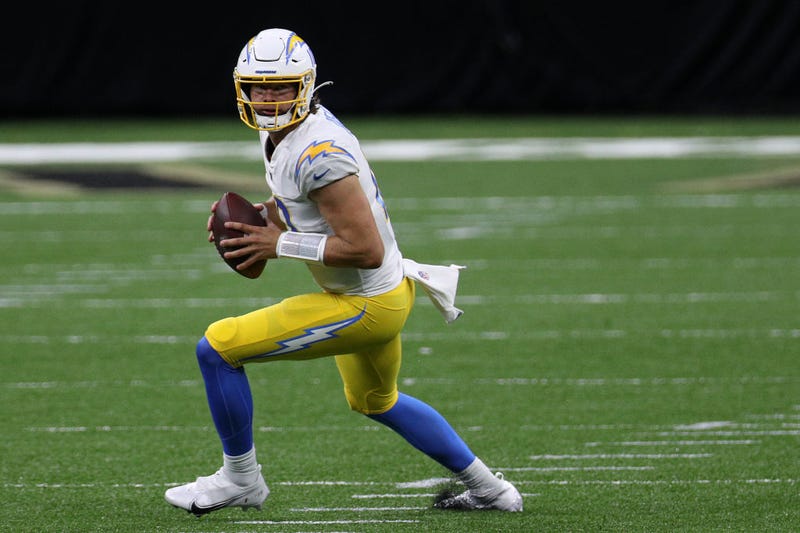 Justin Herbert scans the field against the Saints.