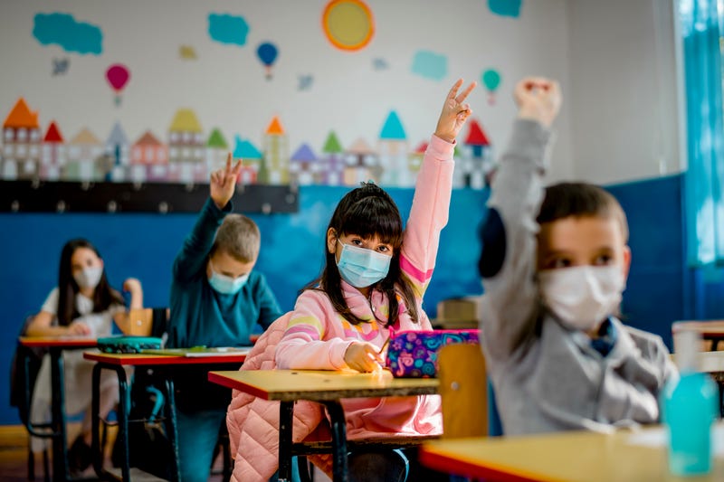 Masked schoolkids