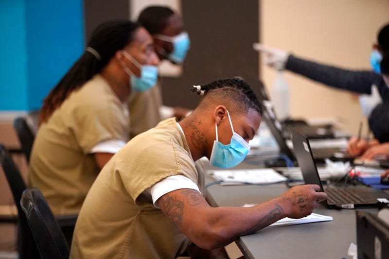 Cook County Jail detainee checks in to polling place