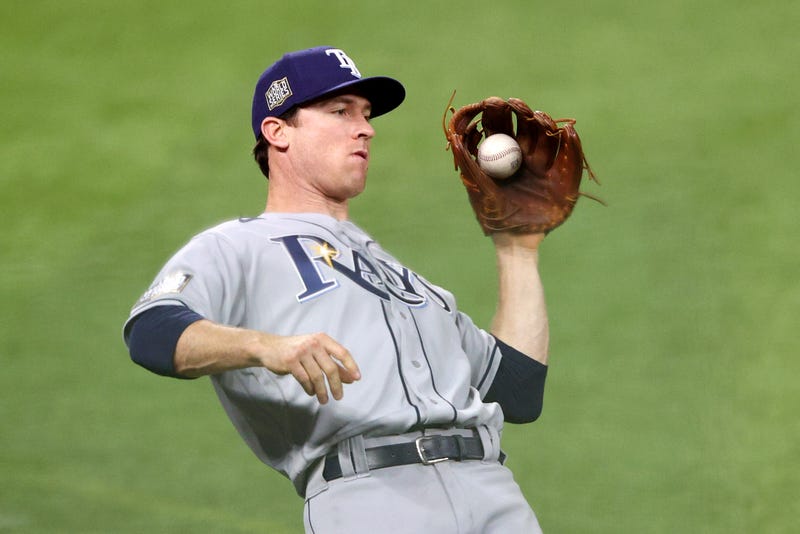Tampa Bay Rays second baseman Joey Wendle catches a fly ball against the Los Angeles Dodgers during the fifth inning in Game Two of the 2020 MLB World Series at Globe Life Field on October 21, 2020 in Arlington, Texas.