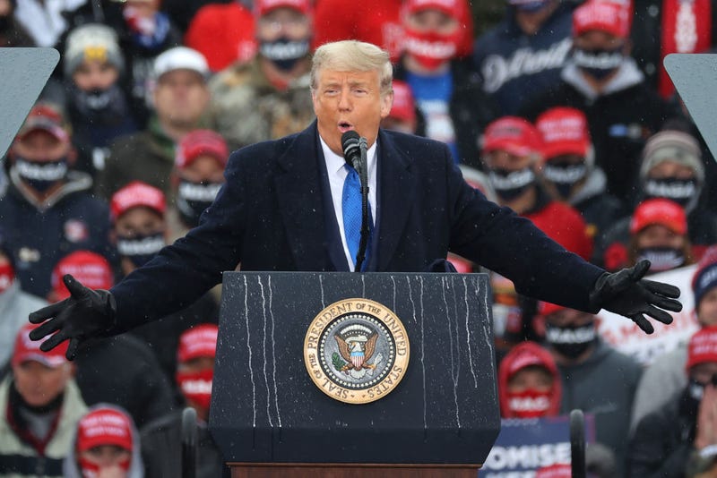 President Trump speaks at a campaign rally in Lansing Michigan
