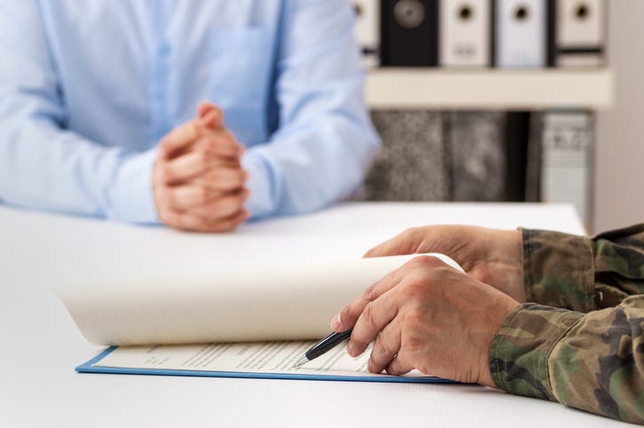 Person enlisting.