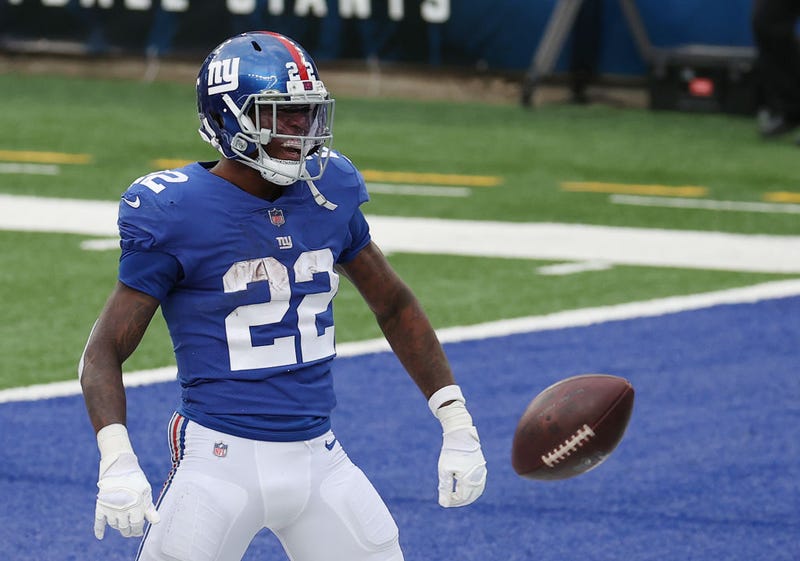 Wayne Gallman celebrates after scoring a touchdown.