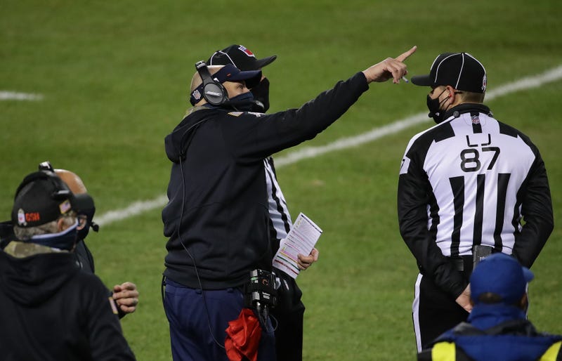 Matt Nagy of the Chicago Bears discusses a play with game officials in the game against the Minnesota Vikings at Soldier Field on November 16, 2020 in Chicago, Illinois.